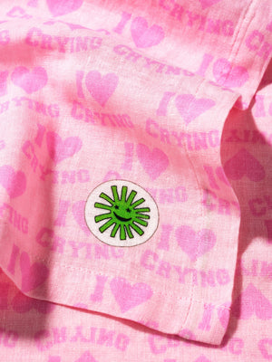 soft cotton baby muslin in stylish i heart crying print close up of the corner design sunny and moon logo
