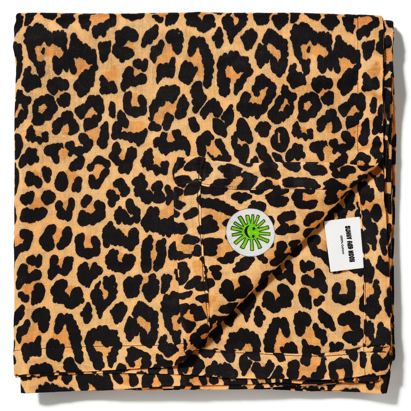 flat layout corner of leopard print swaddle in extra large size by sunny and moon